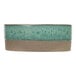 A close-up of a blue and brown speckled Cosy & Trendy stoneware plate.