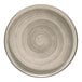 A close-up of a Cosy & Trendy gray stoneware coupe plate with a spiral design on it.