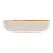 A gray stoneware bowl with brown specks.