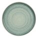A close up of a Cosy & Trendy Ocean Green stoneware plate with speckles.