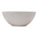 A white bowl with a brown rim.