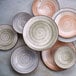 A close-up of a Cosy & Trendy stoneware bowl in ivy green.