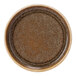 A green porcelain plate with a raised pattern and brown rim.