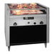 An EmberGlo liquid propane charbroiler with meat cooking on the grill over an open flame.