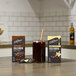 A black box of DaVinci Gourmet Sweetened Cold Brew Instant Coffee on a table next to a glass of coffee.