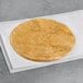 An ALTA Foods chili flour tortilla on white paper.