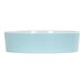 A blue bowl with a white rim.