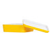 A yellow and white square melamine bento box with a lid.