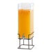 A Cal-Mil plastic beverage dispenser with orange juice inside on a black wire base.