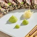 A plate of tuna with S&B Wasabi Paste on the side.