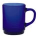 A blue Duralex glass mug with a handle.