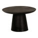 A black Cal-Mil cake pedestal on a black table.