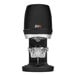 A black automatic espresso tamper with a 58 mm base, designed for consistent coffee tamping.