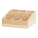 A Cal-Mil maple wood condiment organizer with compartments.