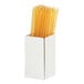 A white Cal-Mil metal condiment display holding a box of yellow stir sticks.