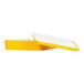 A white rectangular tray with a yellow lid.