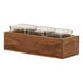 A walnut wooden box with three square glass containers inside.