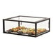 A Cal-Mil black metal bakery display case with food in it.