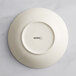 A gray porcelain Acopa Cape deep coupe plate with black text on it.
