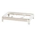 A stainless steel chafing dish on a stainless steel stand with metal legs.