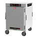 A white rectangular Metro holding cabinet with black wheels and a solid door.