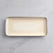 A white rectangular Acopa Cape porcelain platter.