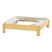 A wooden stand with a metal chafer on top.