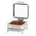 A stainless steel rectangular chafer with food in it on a stand.