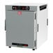 A white rectangular Metro HotBlox holding cabinet with knobs and a red and black label on the front.