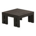 A Cal-Mil black wood square display riser on a table with two legs.