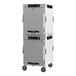A white and gray Metro HotBlox dual cavity holding cabinet with wheels.
