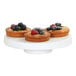 Three mini tarts on a white Cal-Mil melamine cake pedestal with berries.