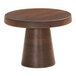 A round brown wooden cake pedestal.
