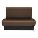 A brown rectangular booth with a black base.