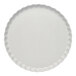 A white Sophistiplate Simply Eco salad plate with a scalloped edge.