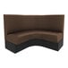 A brown and black curved booth with a white background.