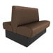 A brown and black booth with brown leather seating and black legs.