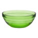 A green Duralex glass bowl with a rim.