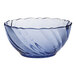A blue Duralex glass bowl with a wavy design.