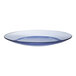 A clear glass plate with a blue rim.