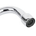 A T&S chrome deck mount faucet with a round base and silver swing nozzle.