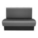 A grey and black rectangular booth from QA Group with a black base.