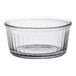 A clear glass Duralex ramekin with a rim.