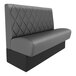 A graphite and black leather tufted single back booth.