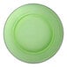 A green Duralex glass soup plate with a black rim.