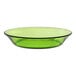 A close up of a Duralex green glass soup plate with a black rim.
