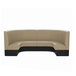 A tan and black curved booth with a half circle back.