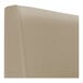 A close up of a fawn leather curved corner booth headboard.