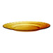 A close up of a Duralex Picardie amber glass plate with a rippled design.