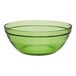 A green Duralex glass bowl with a black rim.